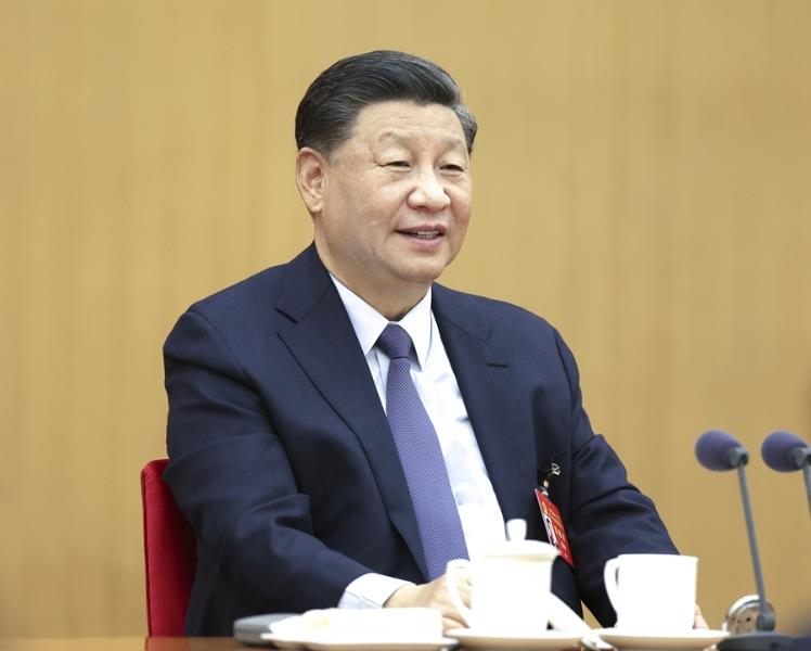 10月17日，習(xí)近平同志參加黨的二十大廣西代表團討論。新華社記者 鞠鵬 攝